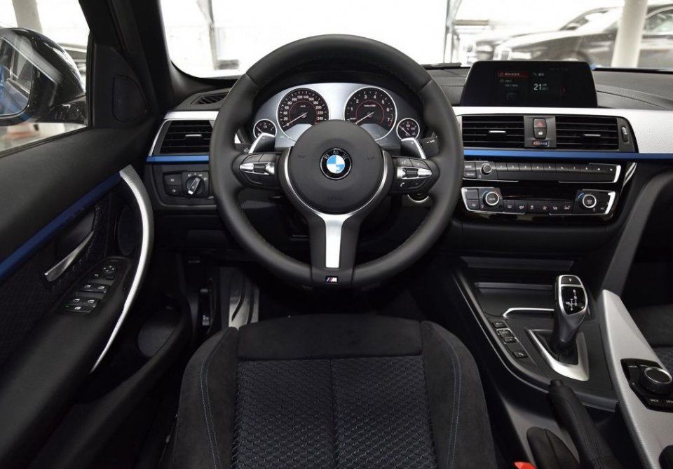 宝马3系买标轴还是长轴?4S店雨刮水防冻液加