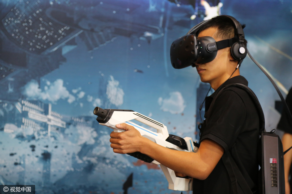北京举行3d虚拟现实展览会 "荷枪实弹"玩转vr