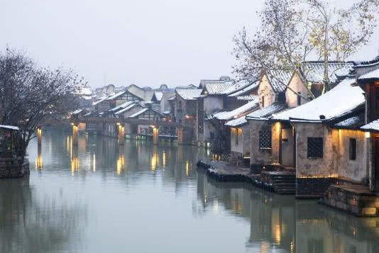 一下雪时间就好像静止了,这些冬日里的古镇你
