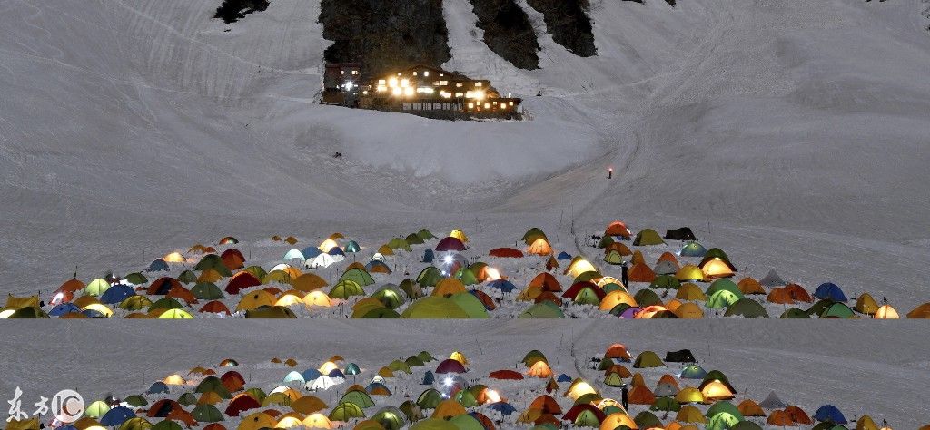 在阿尔卑斯山海拔2300米的雪地上搭帐篷野营