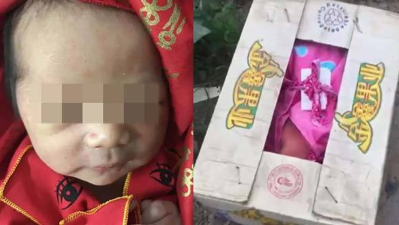 男婴出生仅1天便被装在水果箱里遗弃