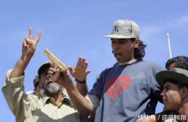 利比亚战争中击毙卡扎菲的男孩,年仅十九岁,五