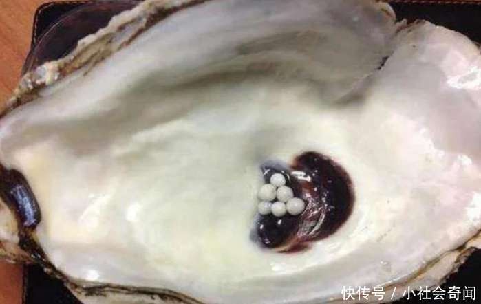 美女夜宵店吃海鲜吃出三十颗珍珠, 店主索取遭