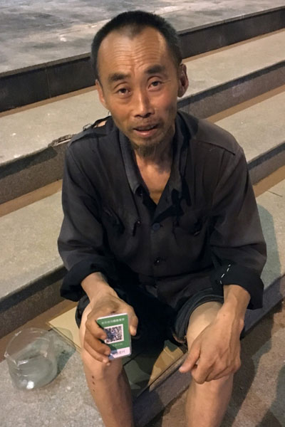 中国移动支付崛起震惊世界:乞讨者都用微信 交