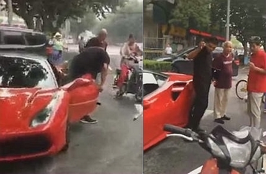 法拉利被电动车刮花 车主却说:算了 法拉利被电动车刮花 车主却说:算了