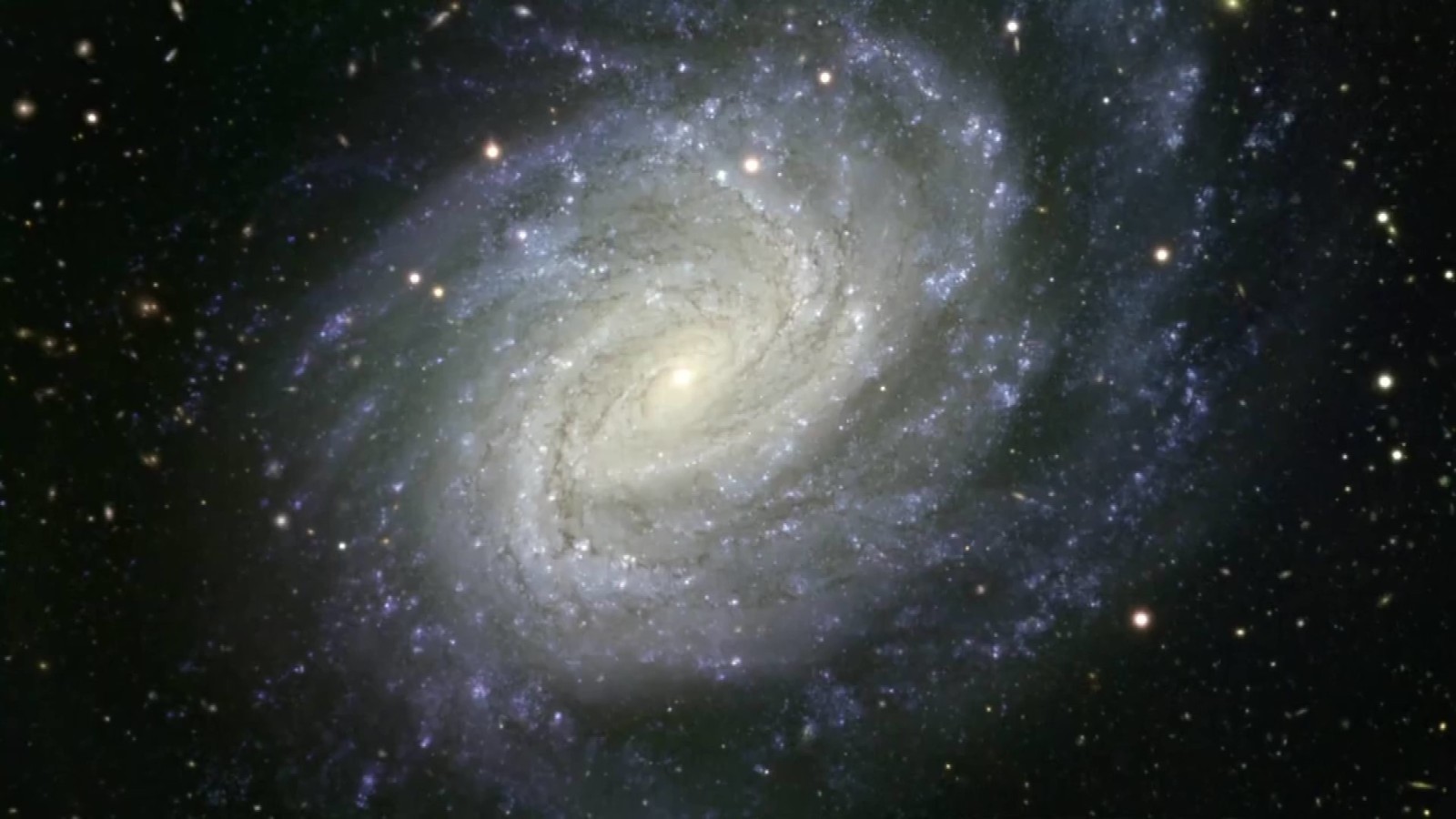 天文学家观测到最遥远旋转盘状星系 天文学家观测到最遥远旋转盘状星系