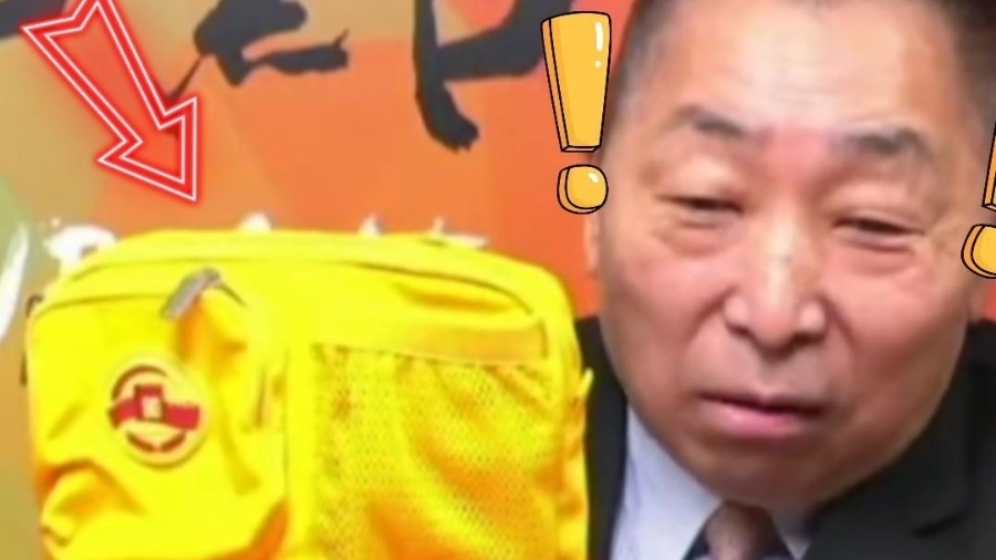 洪秀柱把九三阅兵的纪念包送给唐湘龙
